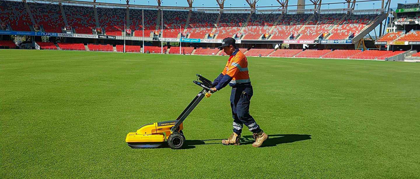 A LADS technician carrying out a ground penetrating radar survey at the Gabba stadium