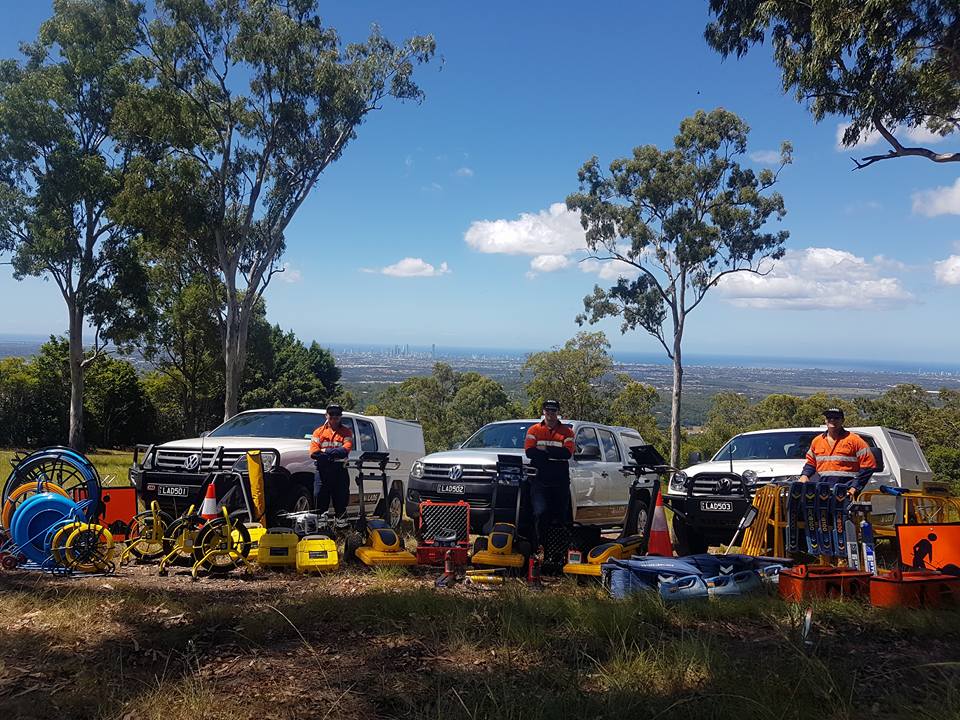 The LADS fleet of vehicles, machines and locating equipment lined up with their operators